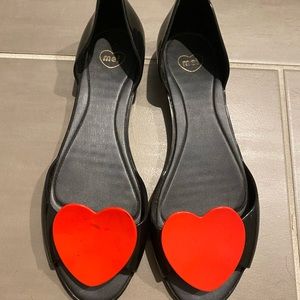Mel gel slip on heart shoes.